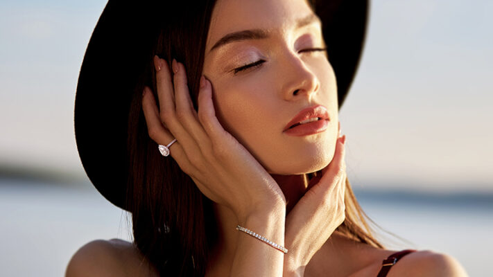 woman-wearing-pear-cut-diamond-ring