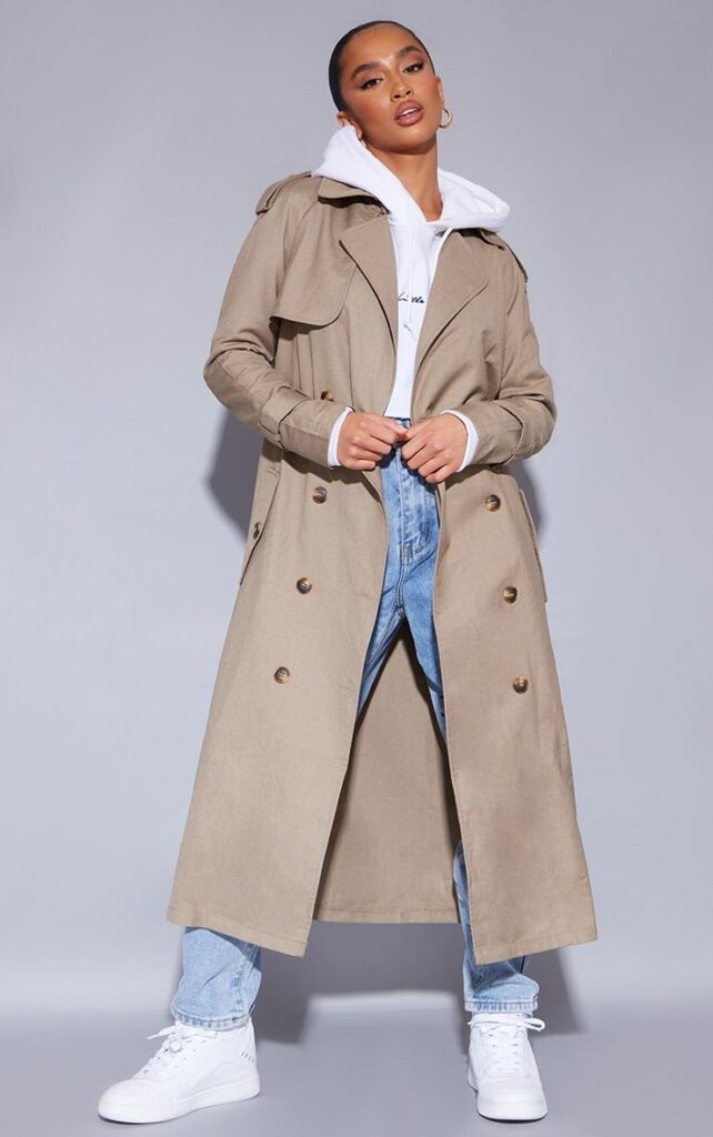 Model wearing Long biege trench coat 