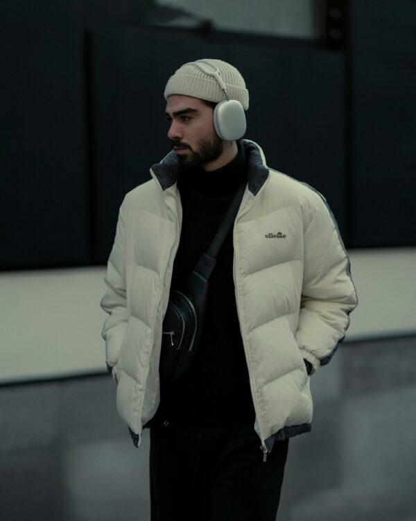 Young man in a trendy puffer jacket outfit