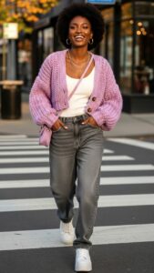 model in jeans with tight blouse and crop sweater
