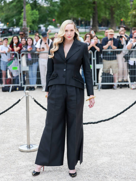 Gwendoline Christie is wearing Schiaparelli at the Paris Fashion Week.