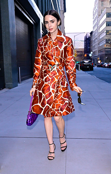 Lily Collins wore a vintage Roberto Cavalli coat dress on the “Emily in Paris” New York press tour.