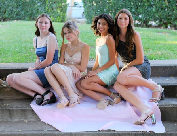 4 Models wearing examples of the KOS couture dress