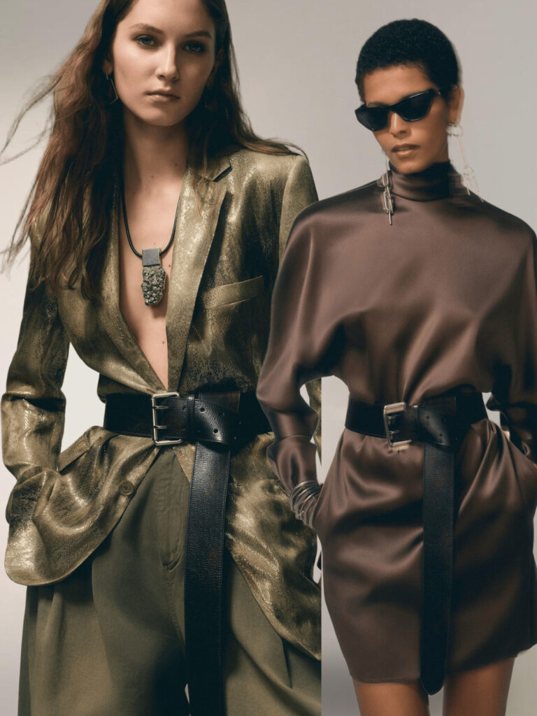 2 Models wearing Ralph Lauren outfits one brown satin the other a green dress