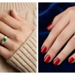 Two hands with green rings