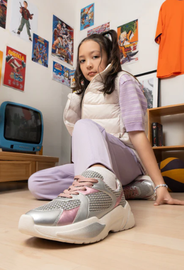 Female Model wearing kids' shoes in Pakistan