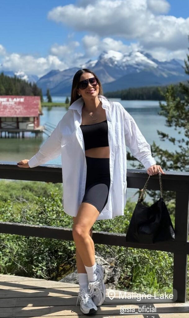 oversized boyfriend dress shirt with black sports bra and matching bike shorts