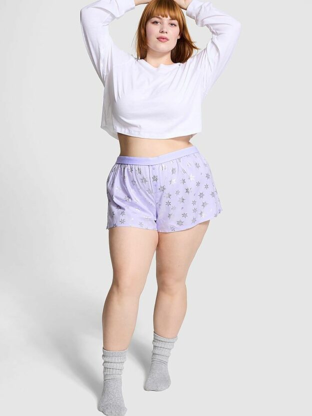 Model in purple sleep shorts