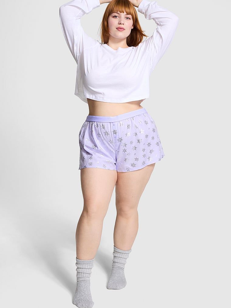 model in purple sleep shorts with crop top