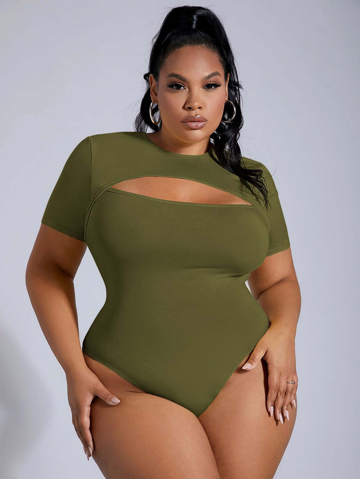 model wearing a green short sleeve bodysuit