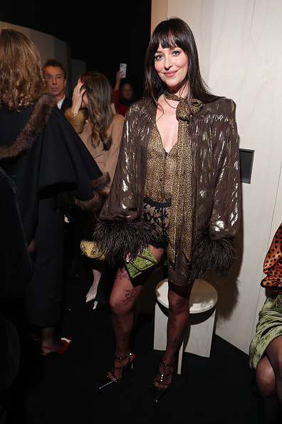 Dakota Johnson in a Metallic Cardigan and Lace Hot Pants at the Valentino Haute Couture Spring/Summer 2026