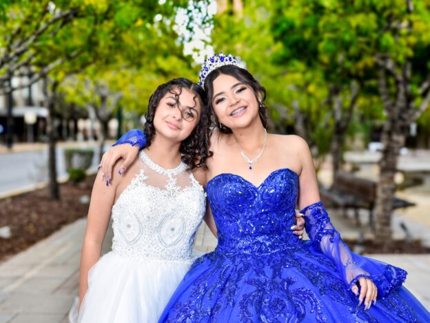 models wearing 2 versions of perfect prom dress white and dark blue