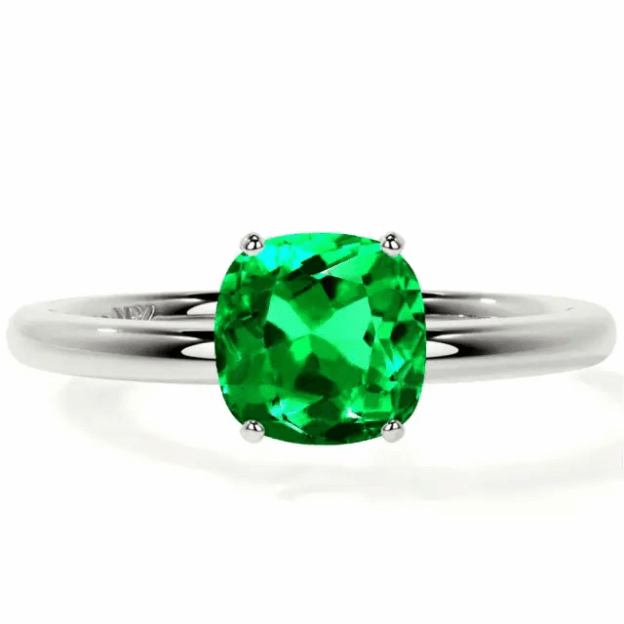 solitaire emerald engagement ring