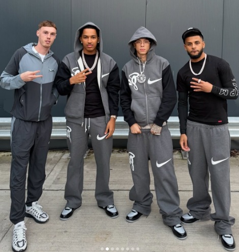 4 models wearing the Syna World Central Cee Nike Tech tracksuit 