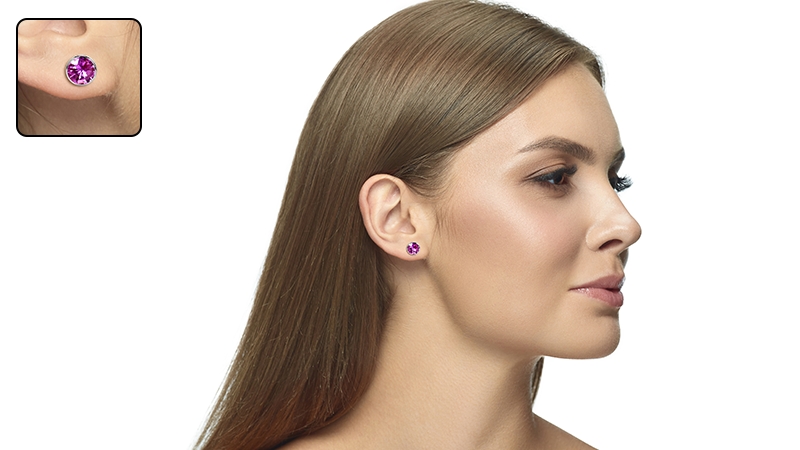 Model wearing pink sapphire earrings