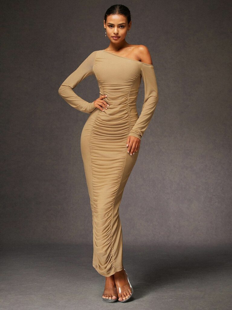 Model in full length biege Boidycon dress
