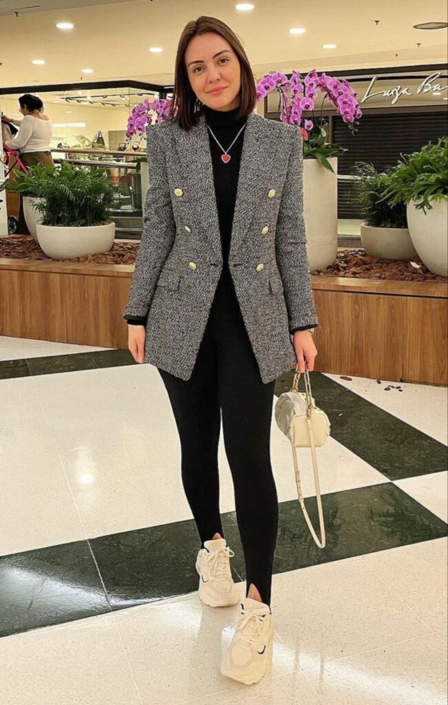 Model in gray blazer to emphasize blazers today 