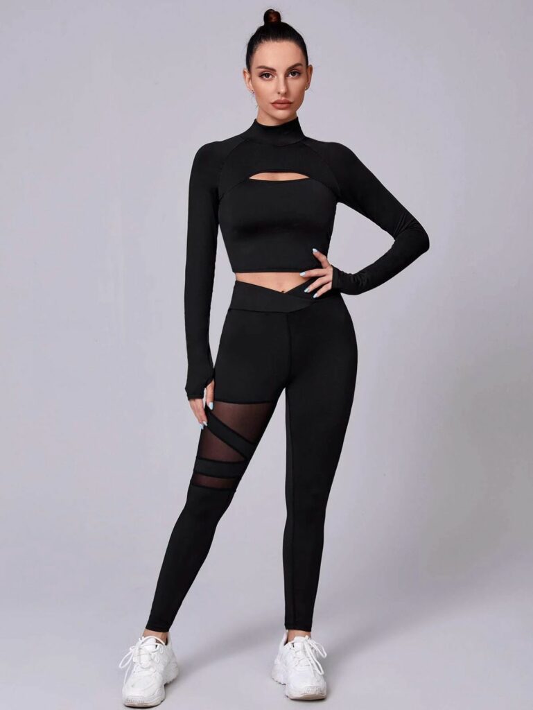 Model in tweo piece Gym sets with crop top in black