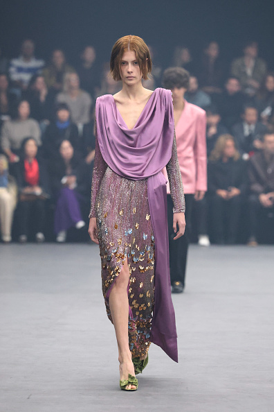 A model walks down the runway during the Valentino Womenswear Spring/Summer 2026 collection titled “Fireflies” and designed by creative director Alessandro Michele.