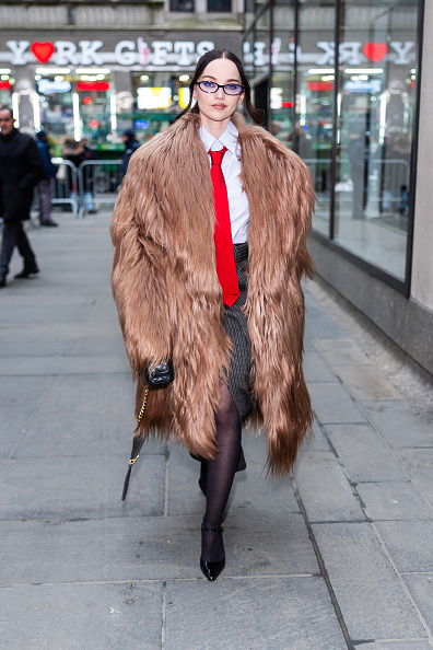 Dove Cameron looks sleek and gorgeous on the streets of New York City on Monday, February 16, 2026, wearing Ferrari ensembles from the Fall/Winter 2025/2026 “Officina” (workshop) collection.