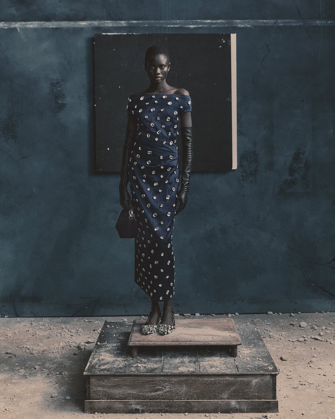 Model wearing an embroidered satin pencil dress from Erdem Moralolu’s PRE-FALL 2026 collection.