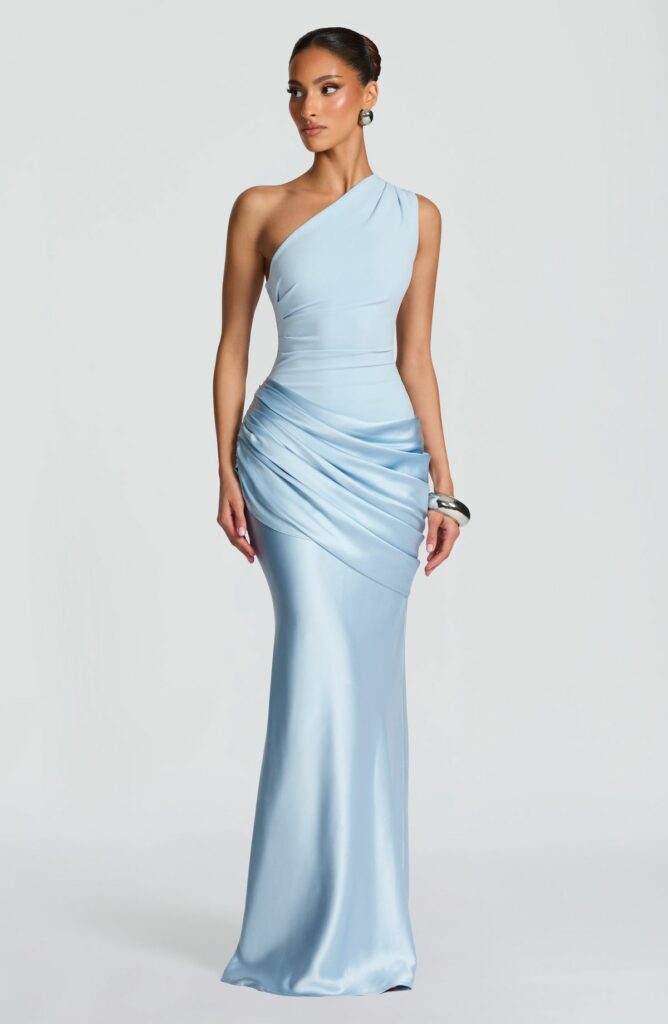 Model in Glacier blue evening dress 