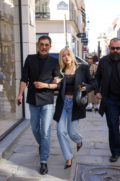 Rose in jeans, crop top and black blazer in Paris 
