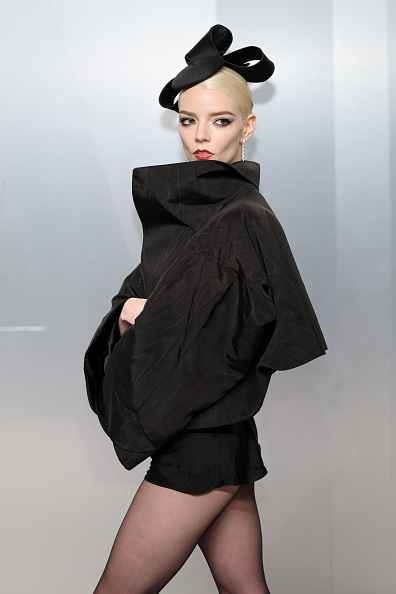 Anya Taylor-Joy arrived at the 2026 Vanity Fair Oscar Party draped in a vintage John Galliano jacket paired with a satin hat by Stephen Jones Millinery from the Fall/Winter 1994 line.