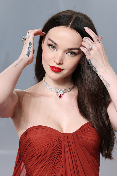 Dove Cameron exuded chic at the 2026 Vanity Fair Oscar Party hosted at the Los Angeles County Museum of Art in Los Angeles, California, donning a Georges Hobeika haute couture off-the-shoulder ruched gown, complemented by a Pasquale Bruni Heart to Earth choker with a ruby drop, a Bernini engagement ring, and a Pasquale Bruni Aleluiá ring.