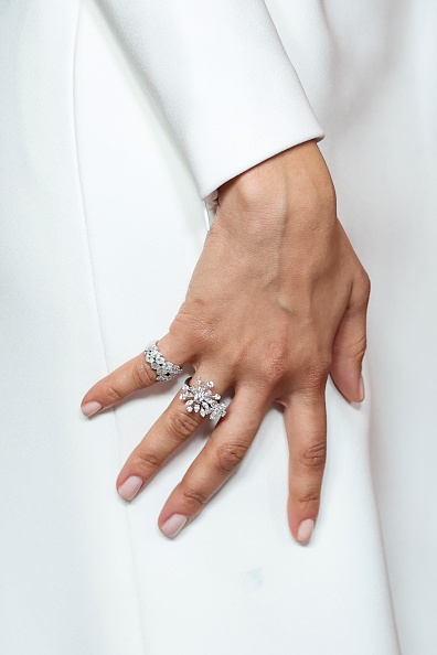 Zendaya attended the Paris premiere of “The Drama,” donning a white gown by Louis Vuitton and accessorizing with white diamond rings from David Morris.