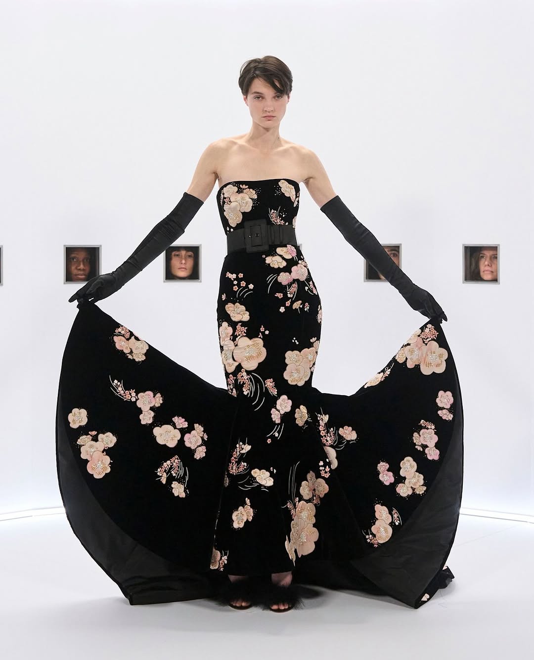Tanya Churbanova walked the runway for Valentino Haute Couture’s Spring/Summer 2026 ready-to-wear collection, Specula Mundi, in a black strapless floral-embroidered velvet gown, which Anne Hathaway also wore to the 98th Academy Awards.