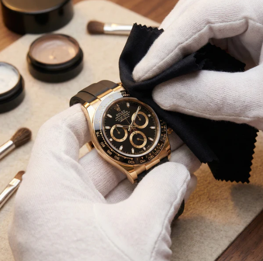 white gloved hands polisiong luxury watches in Dubai