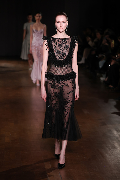 Lucy Liu wore a Georges Hobeika sleeveless sheer mesh embroidered midi dress from the brand’s Fall/Winter 2026-2027 collection for “The Devil Wears Prada 2” New York premiere.