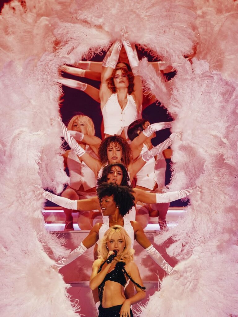 Sabrina Carpenter performed at the 2026 Coachella wearing Beaded Fringe Two-Piece Dior Outfit.