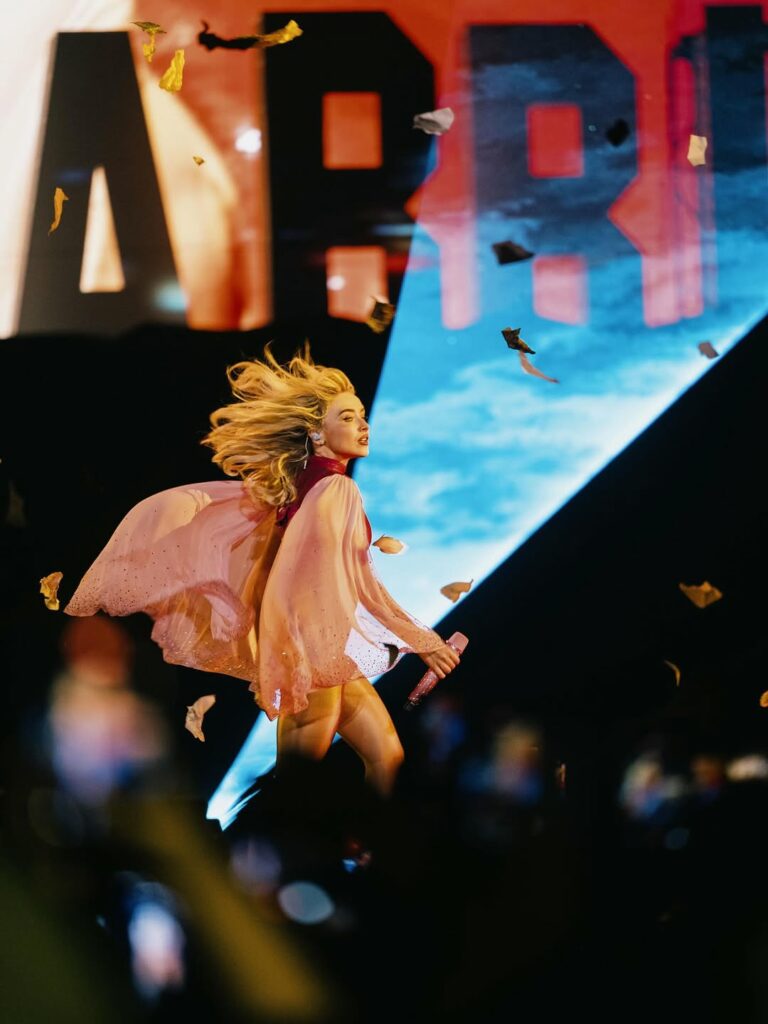 The vibrant pink palette and edgy cut turned the look into a standout, reflecting Sabrina Carpenter’s youthful energy.