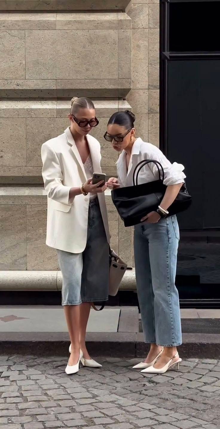 two women waring white basic heels 