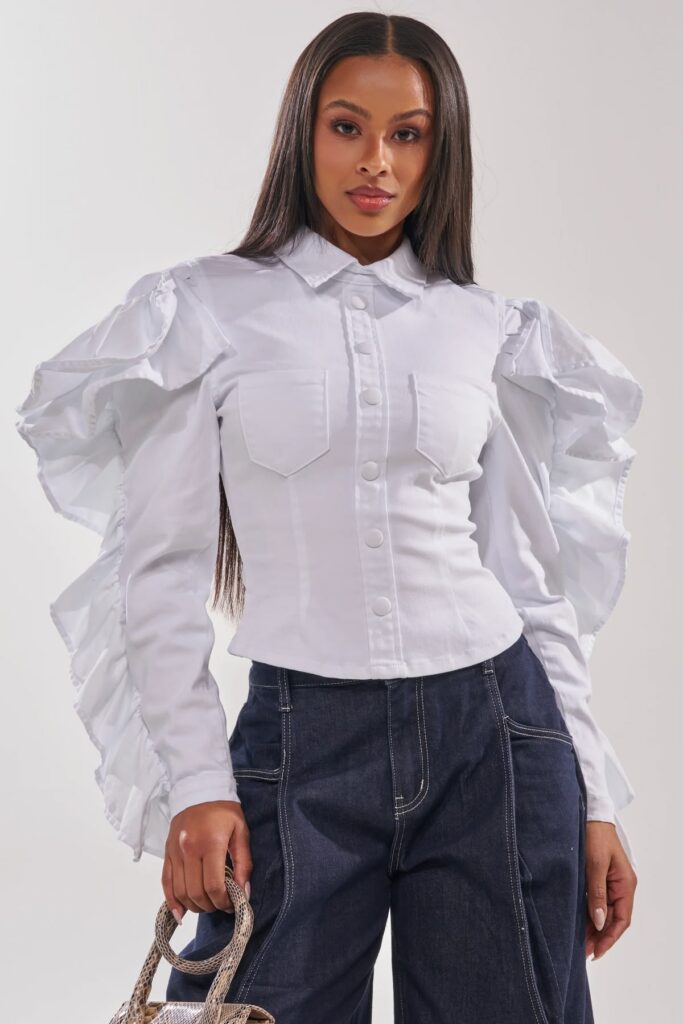 Model in white puff sleeve shirt 