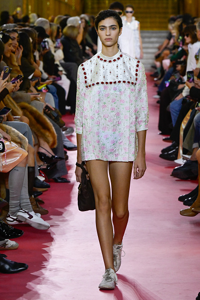 Model on the runway at the Miu Miu fashion show 