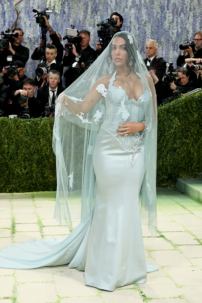 Georgina Rodríguez graced the red carpet at the 2026 Met Gala: Costume Art in a breathtaking bespoke light blue sleeveless halterneck satin dress featuring an intricate bustier corset.