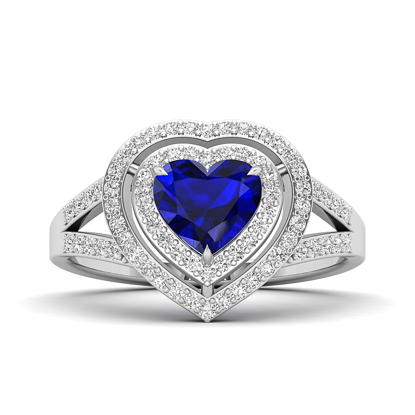 Gemstone Jewelry - Silver ring with a blue heart-shaped gemstone encircled by two halos of diamonds on a pavé-studded band