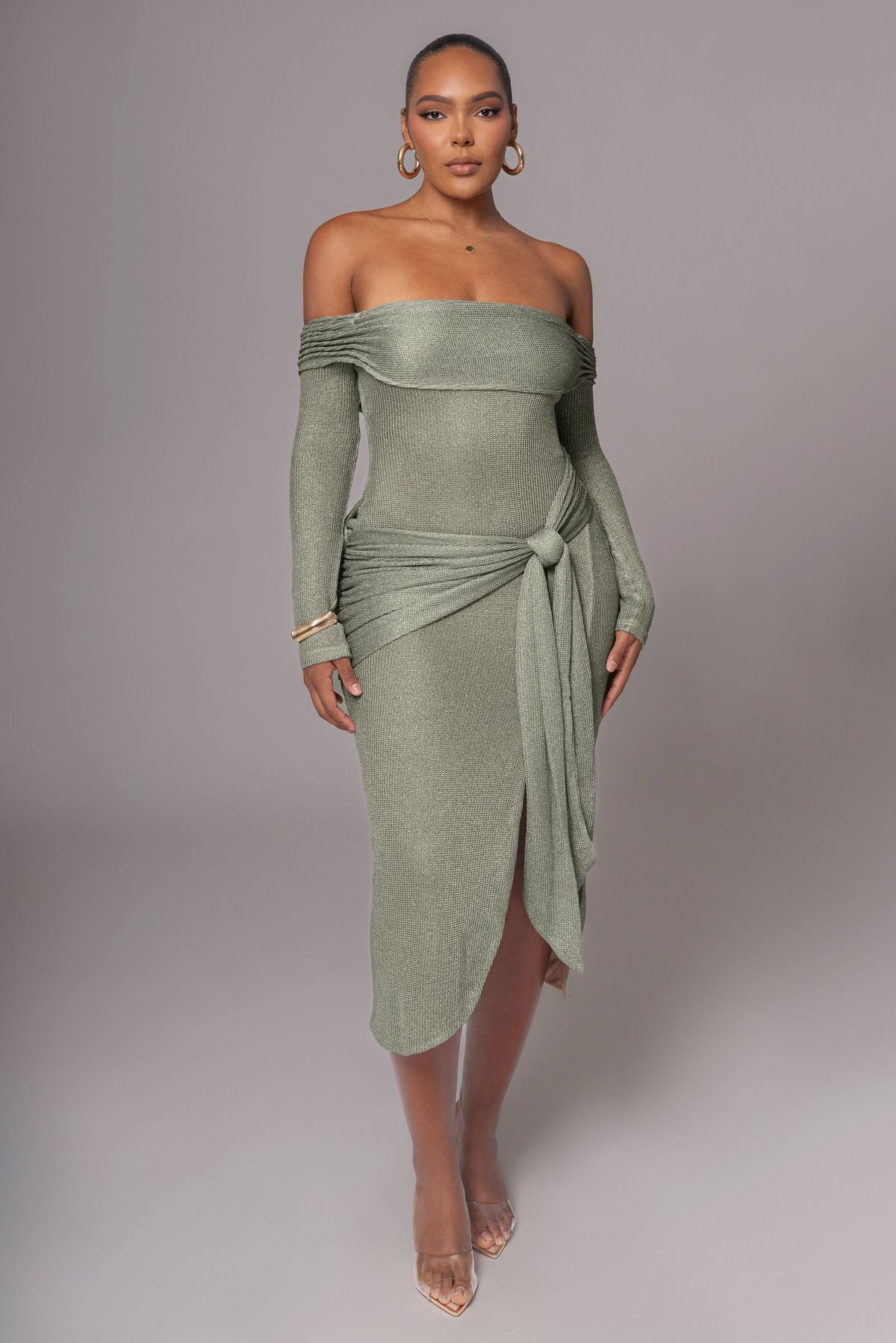 model in  sage green knit dress
