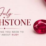 July birthstone: ruby; two red gemstones on pink background with elegant typography.