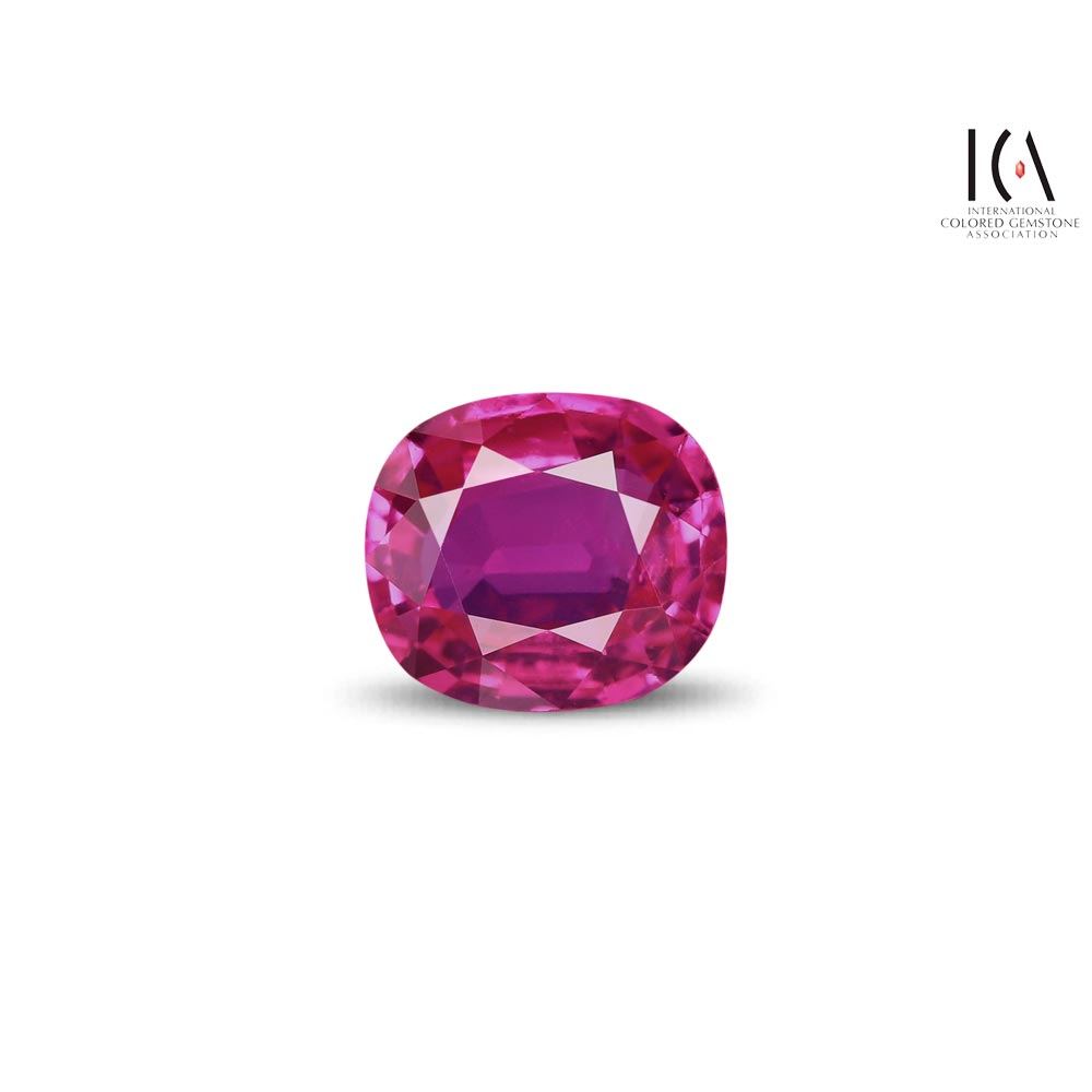 Cushion-cut ruby stone on white background with ICA logo in the top-right.