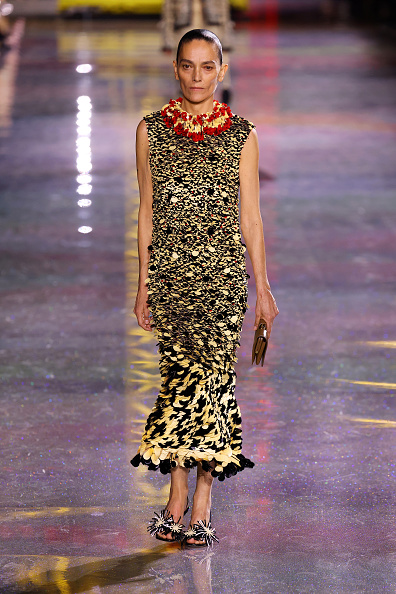Chanel’s Fall/Winter 2026–2027 collection featured a sleeveless, multicolored column midi dress, which was worn by Lupita Nyong’o at the brand’s “Gaby and the Beanstalk” Haute Couture Fall/Winter 2026/2027 show.