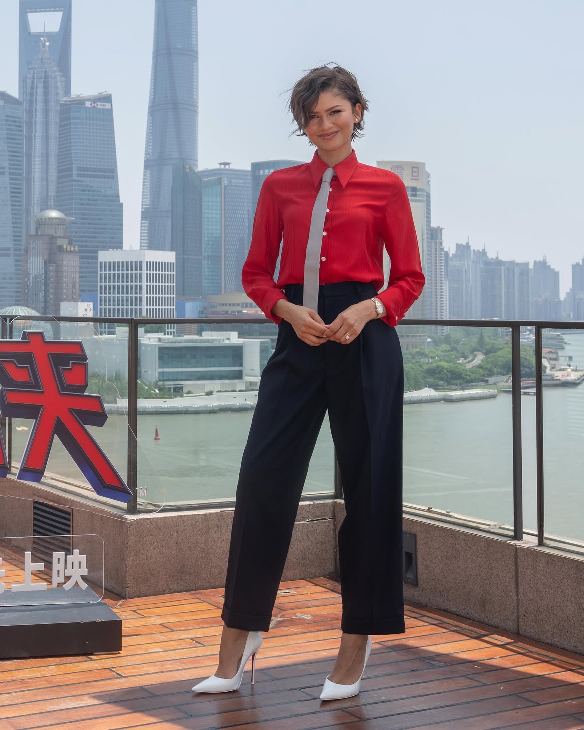 Zendaya attended a photo call in an elegant, menswear-inspired suit from the Coach Resort 2027 ready-to-wear collection.