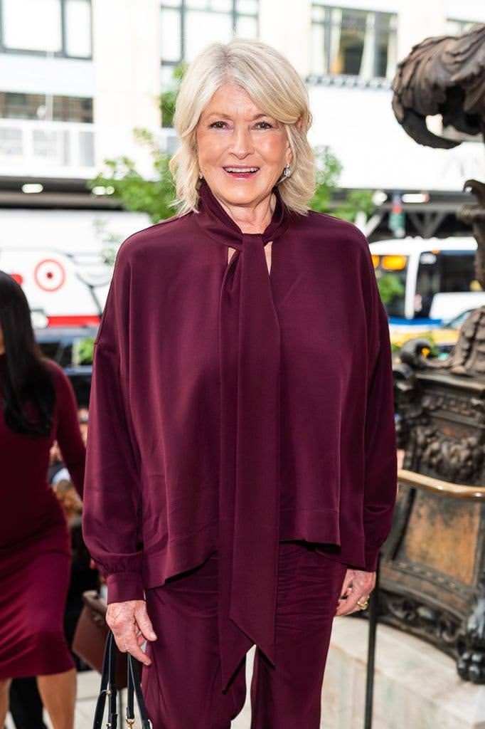 Martha Stewart turned heads in an opulent monochromatic burgundy look.
