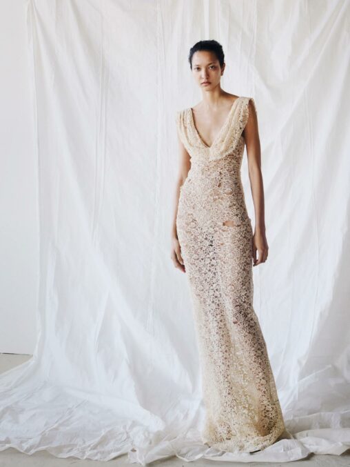 Colleen Allen’s Fall/Winter 2026 ready-to-wear collection featured a bold, underwear-baring draped dress fashioned from sheer floral lace, defined by its distressed knit texture and intricate openwork detailing throughout