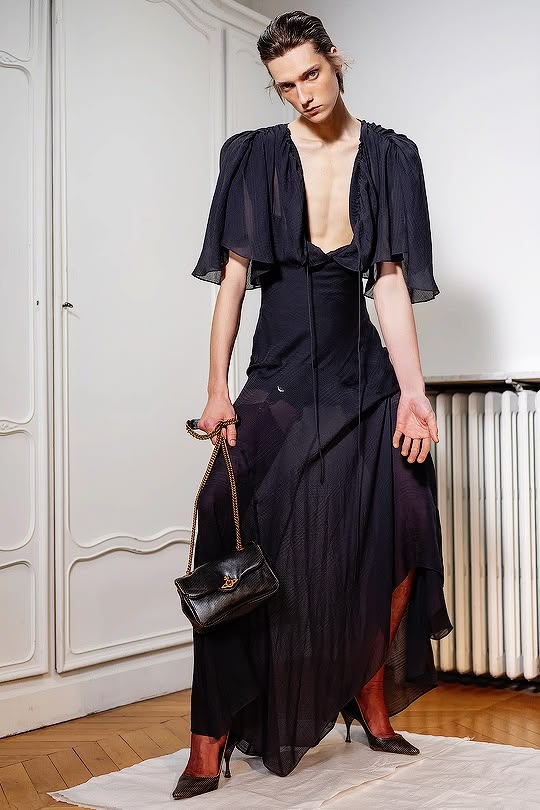 Vivienne Westwood’s Fall/Winter 2026 collection featured the semi-sheer Priscilla maxi dress, crafted from fluid modal, silk, and wool-blend jacquard muslin—the same design Kendall Jenner wore to the 2026 Venice International Film Festival.
