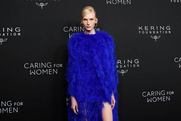 Alex Consani rocking a custom electric blue Gucci couture gown from the Cruise 2027 collection.