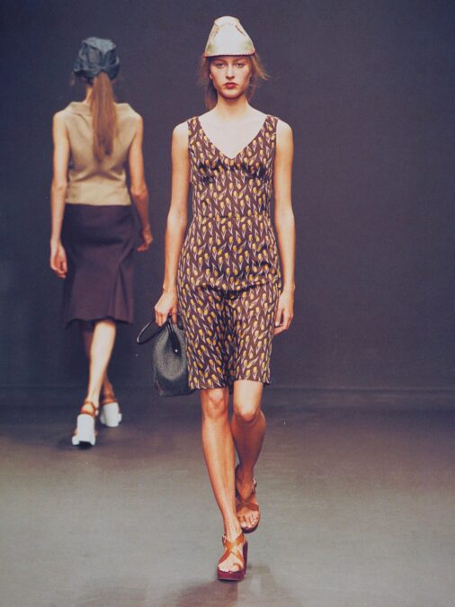 A fashion model was photographed walking in Miu Miu’s Fall/Winter 2000 ready-to-wear show in a silk slip dress adorned with a tulip floral print